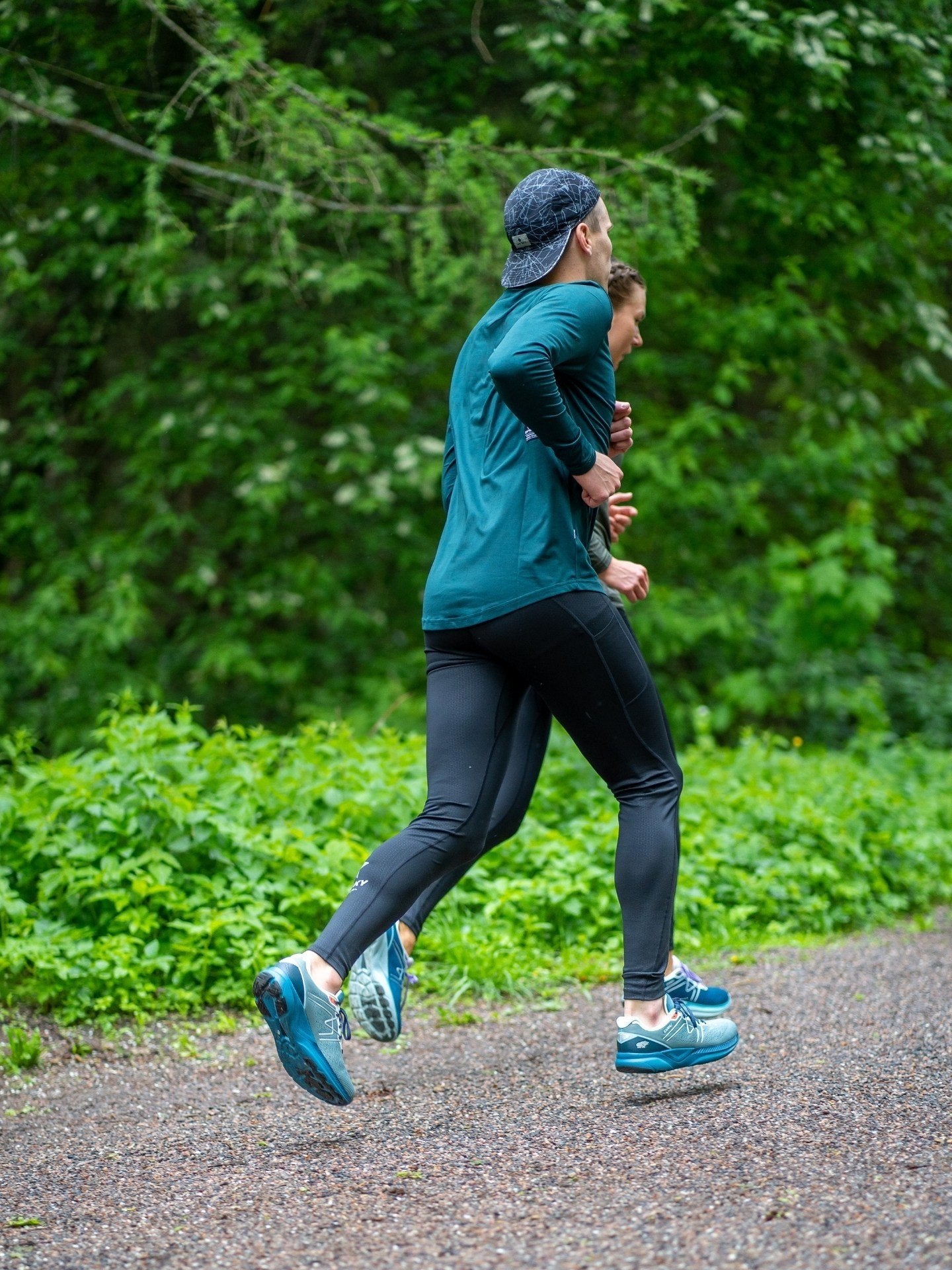 KARHU Fusion 3.5 running on dirt road